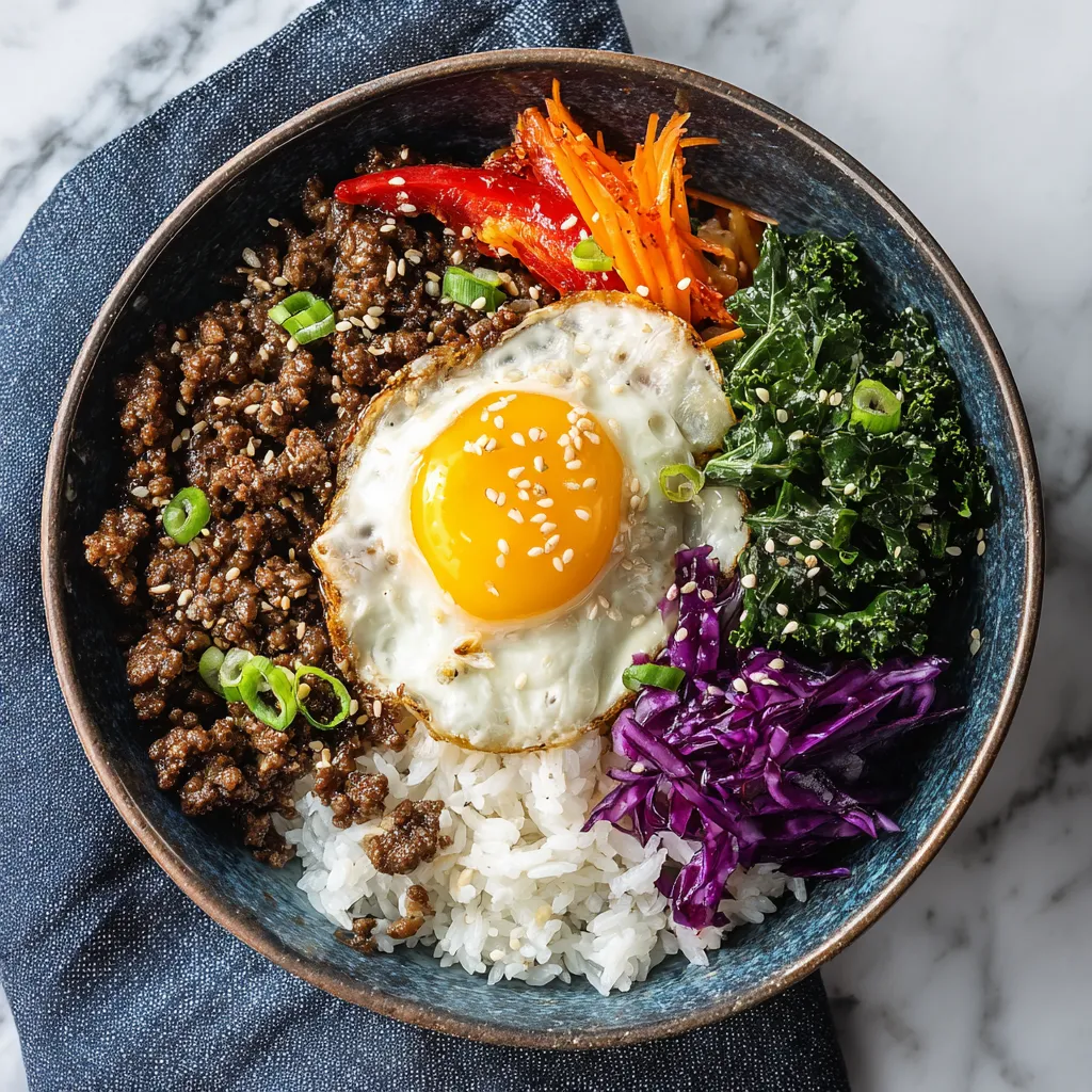 A bowl of Korean ground beef with vegetables.