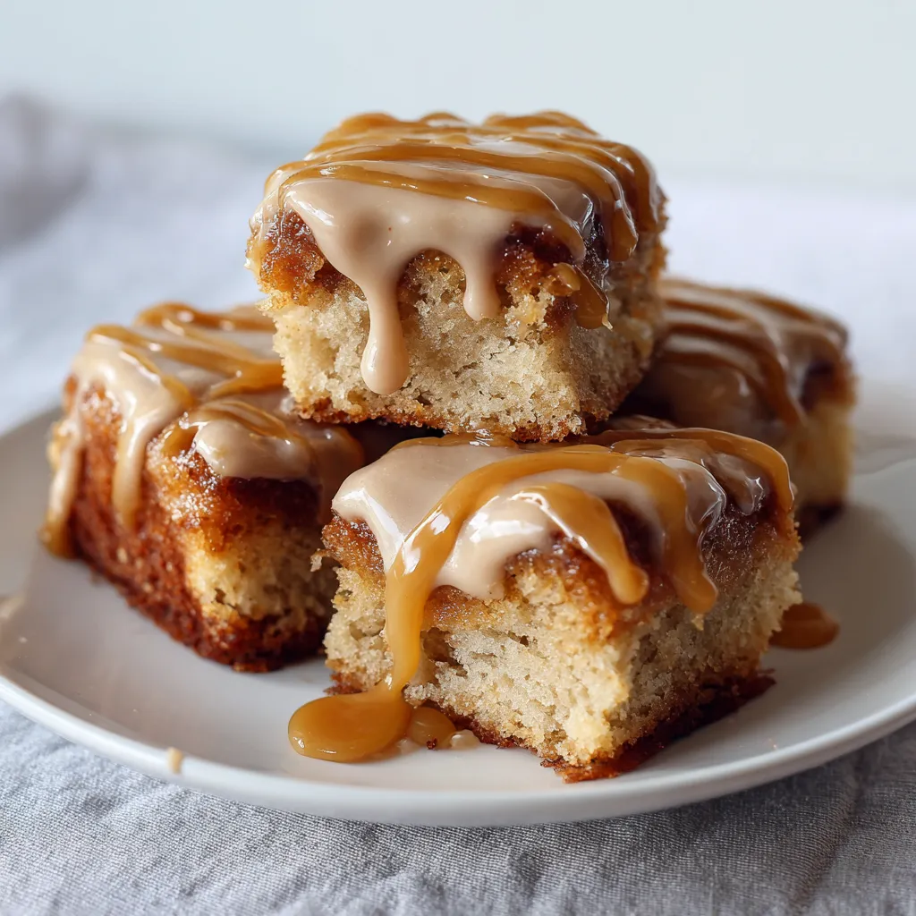 Three soft baked maple donut bars on a plate.